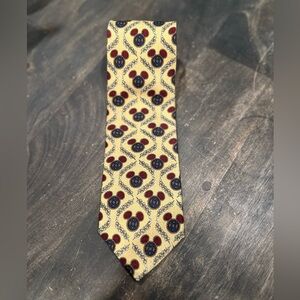 The Disney store men’s necktie with subtle and classic Mickey ears.